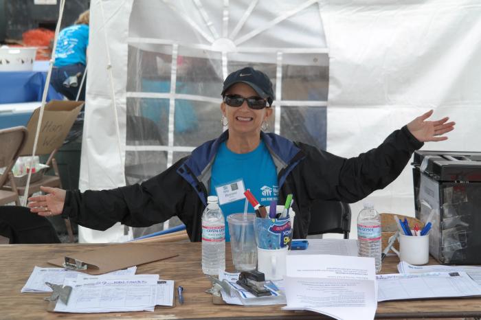 Beezee Honan of Designer Bath mans the registration table