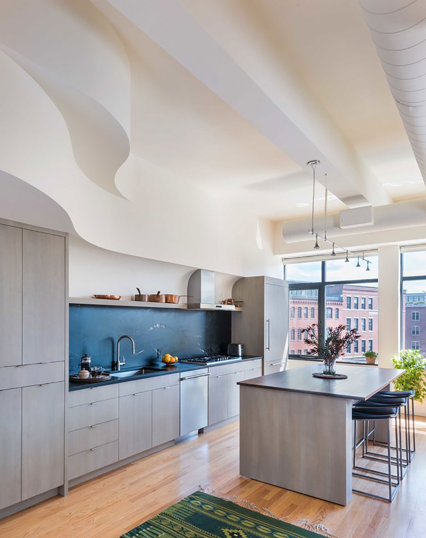 Contemporary makeover for an artist's loft kitchen